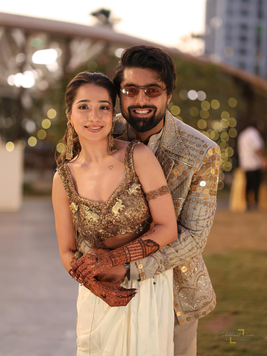 Urvi's Customised Gold armlet and earrings for sangeet