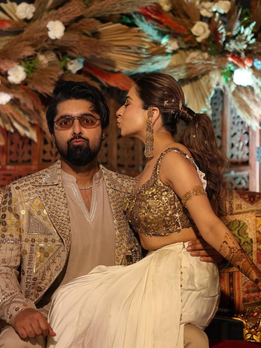 Urvi's Customised Gold armlet and earrings for sangeet