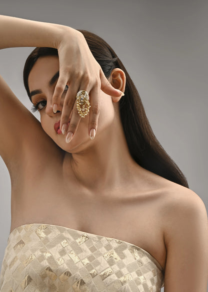 White and golden ring with kundan detailing